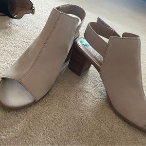 Tan velcro strap sandal.